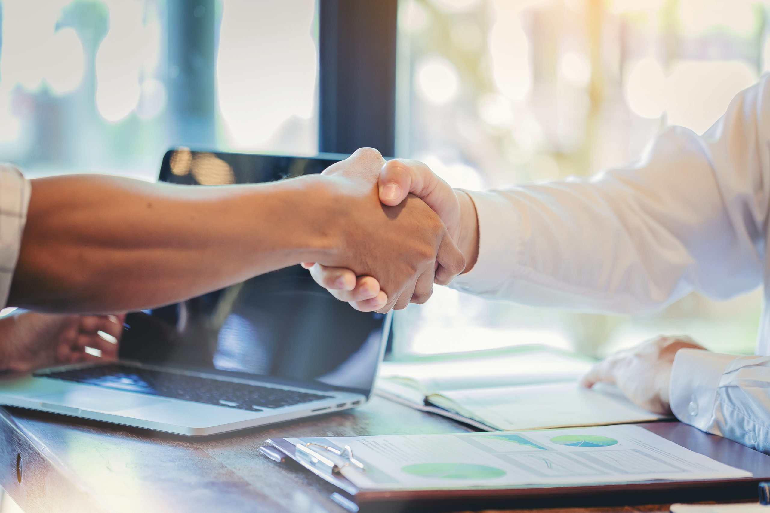 Businessman handshake at business meeting after negotiations wit